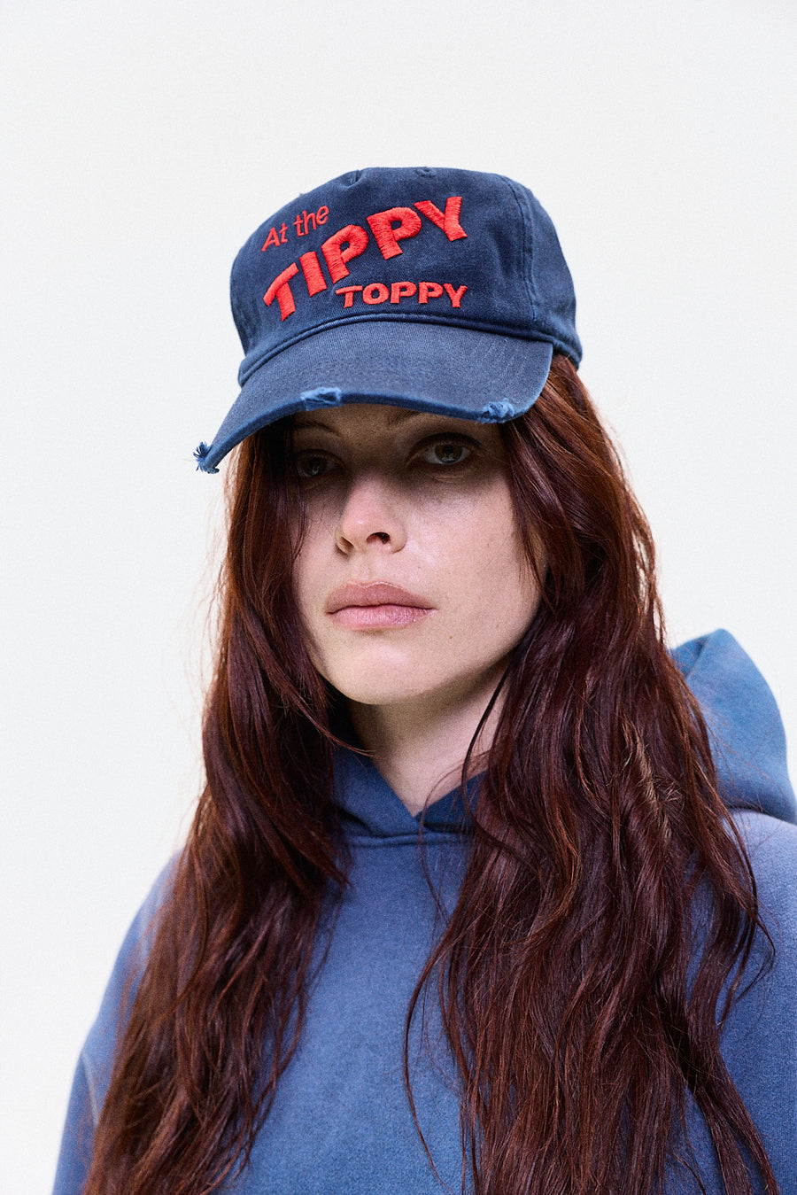"At the tippy toppy" blue cap