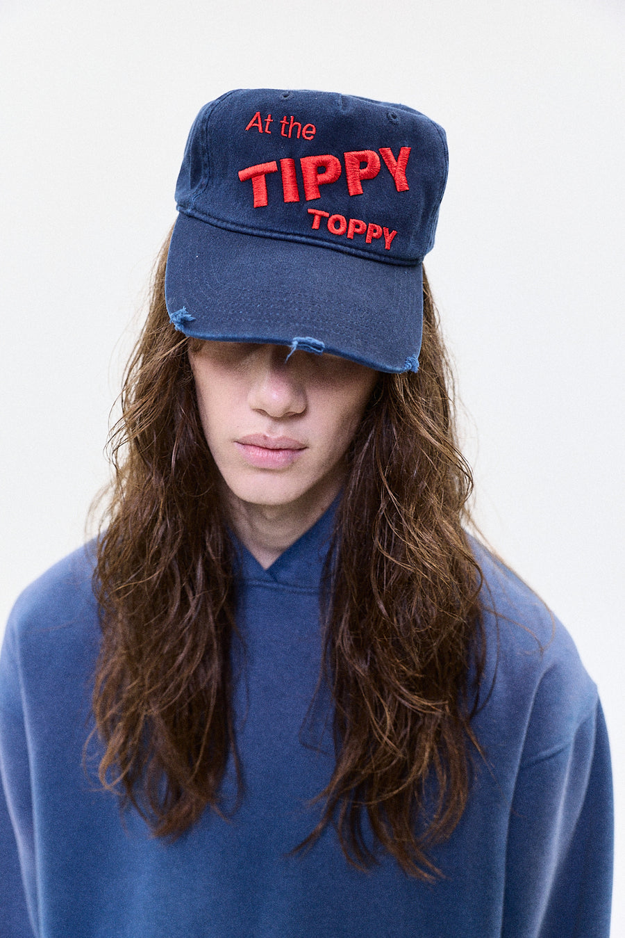 "At the tippy toppy" blue cap