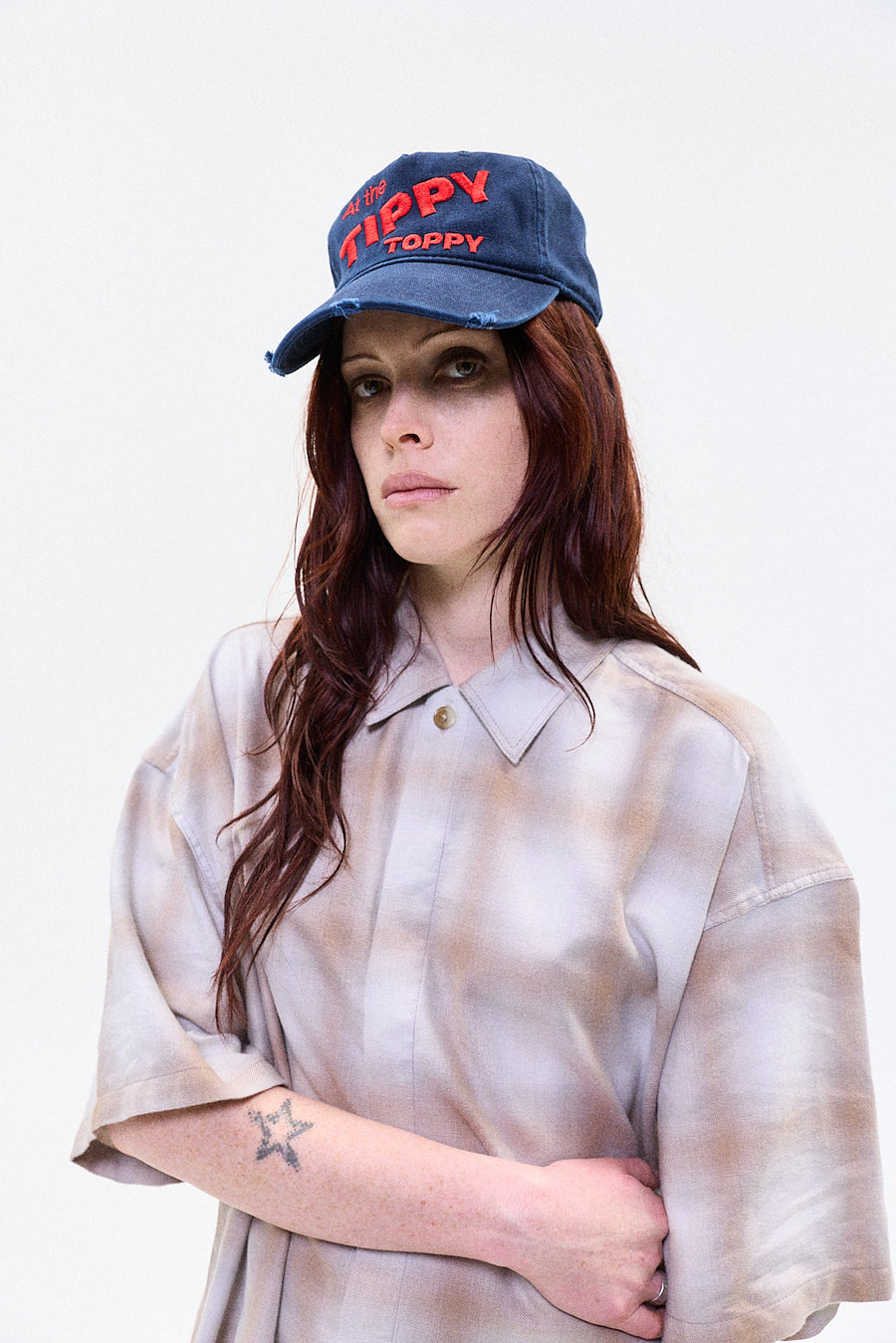 "At the tippy toppy" blue cap