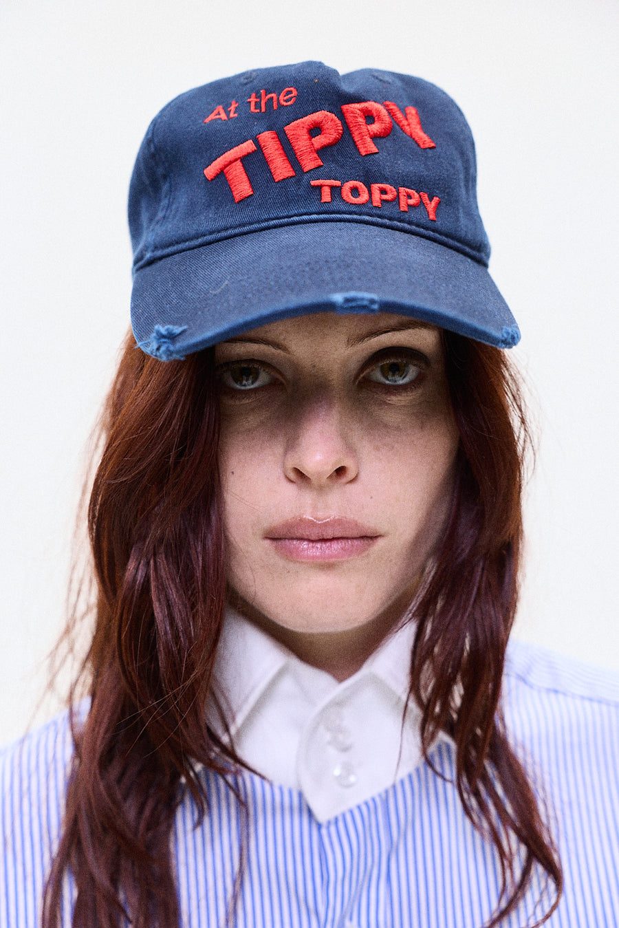 "At the tippy toppy" blue cap